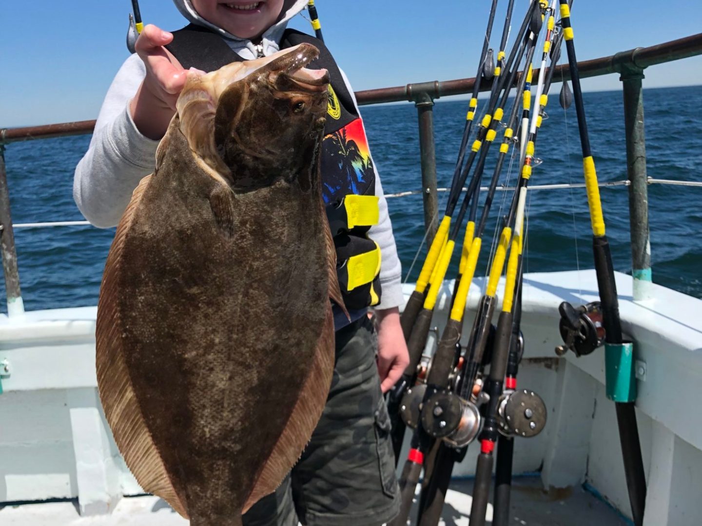 a man and a dog on a boat