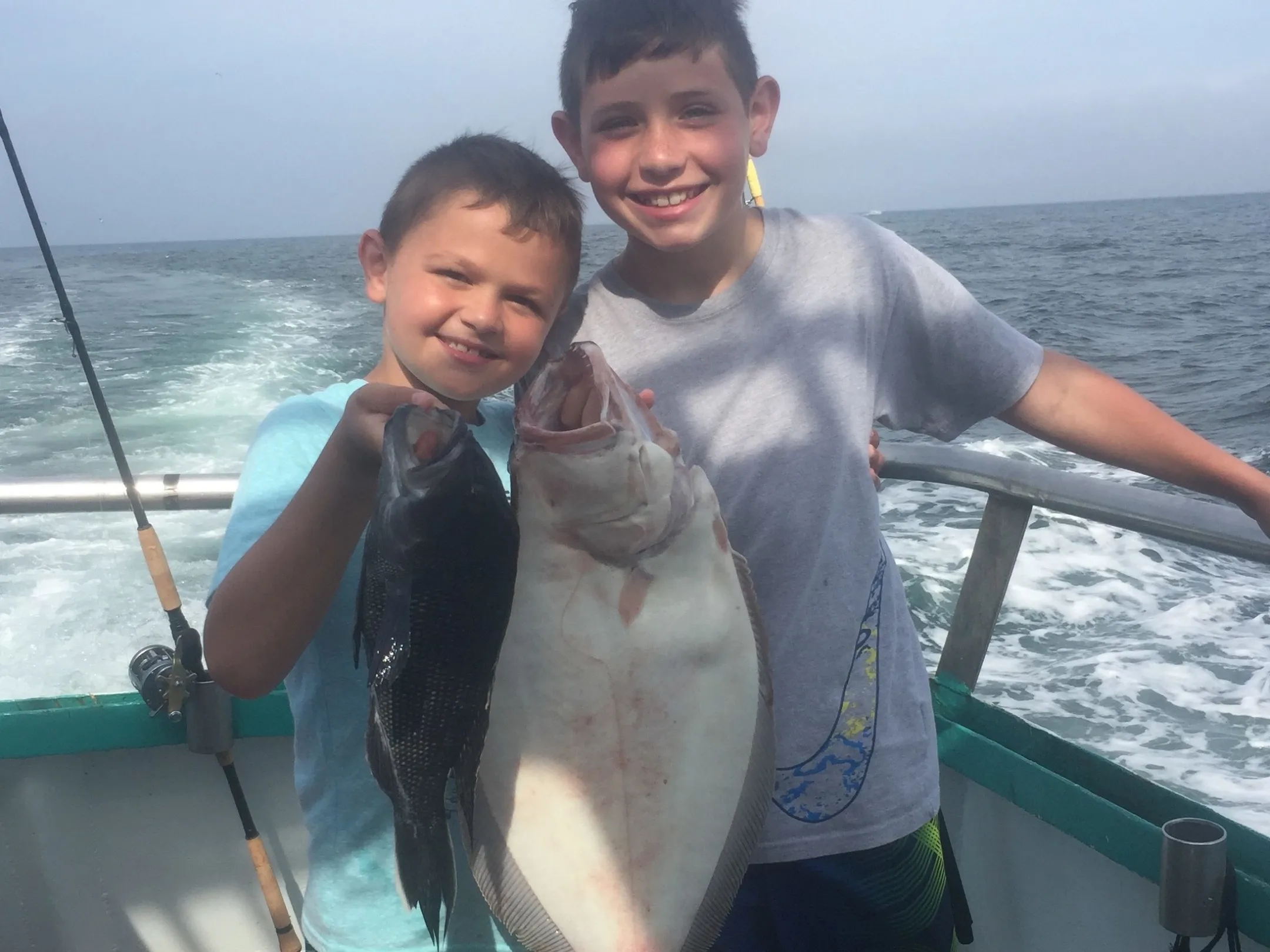 a man standing on a boat in the water