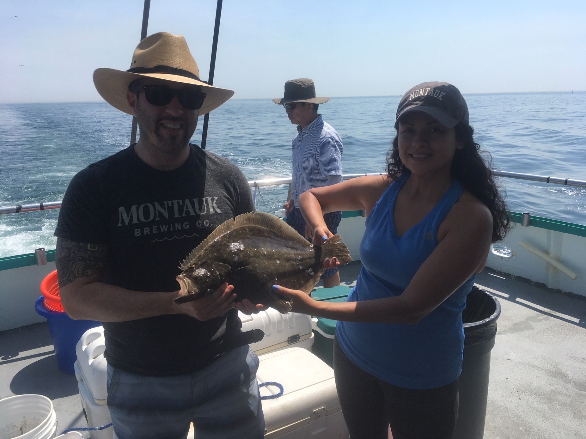 a person standing next to a body of water