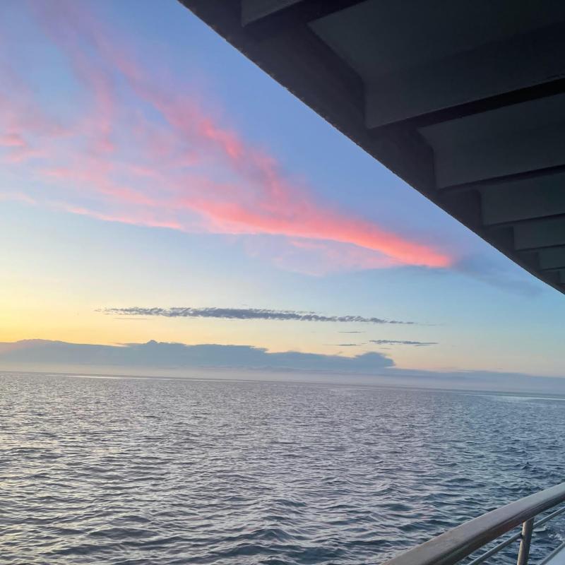 a sunset over a body of water