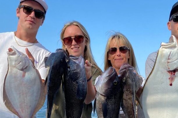 a group of people posing for the camera