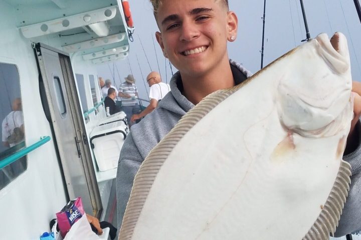 a person standing posing for the camera