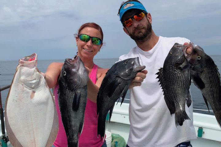 a man holding a fish