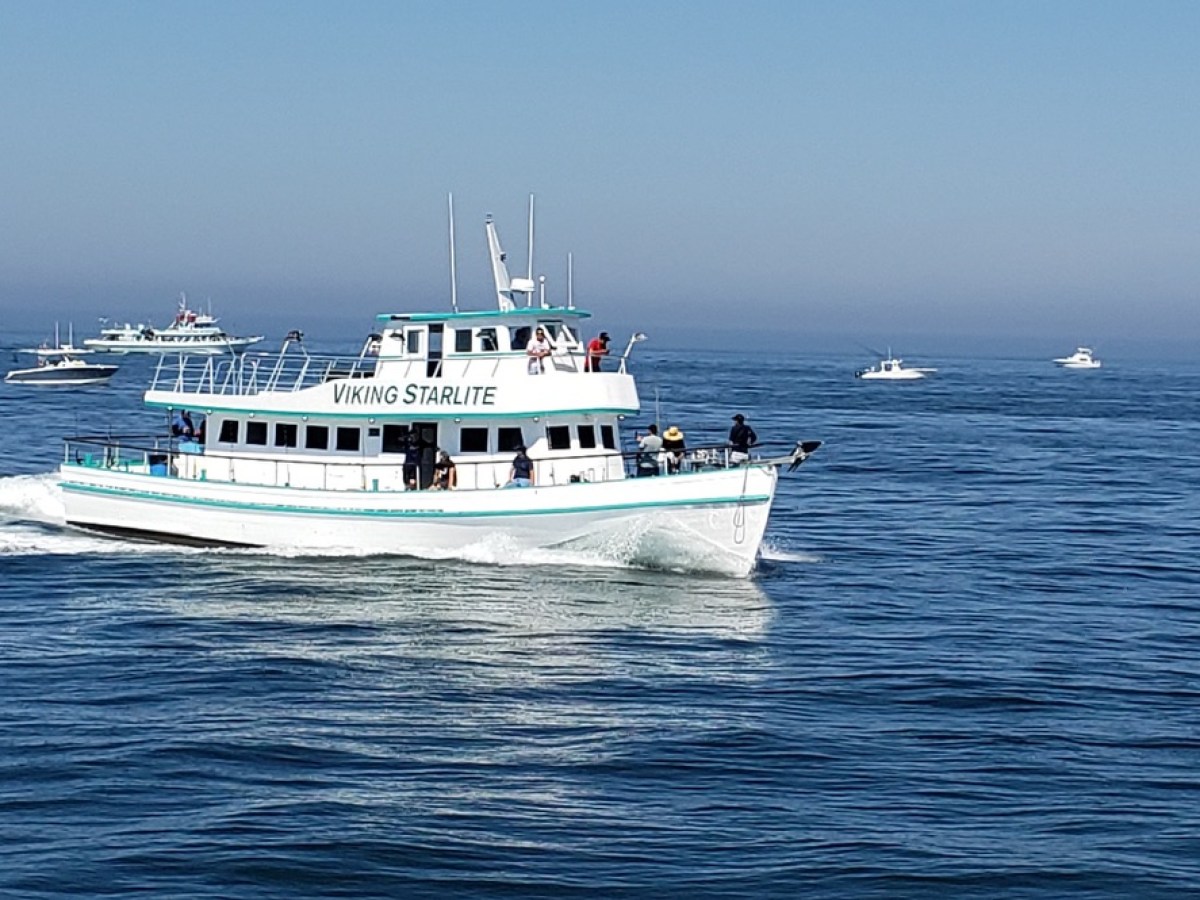 a small boat in a large body of water