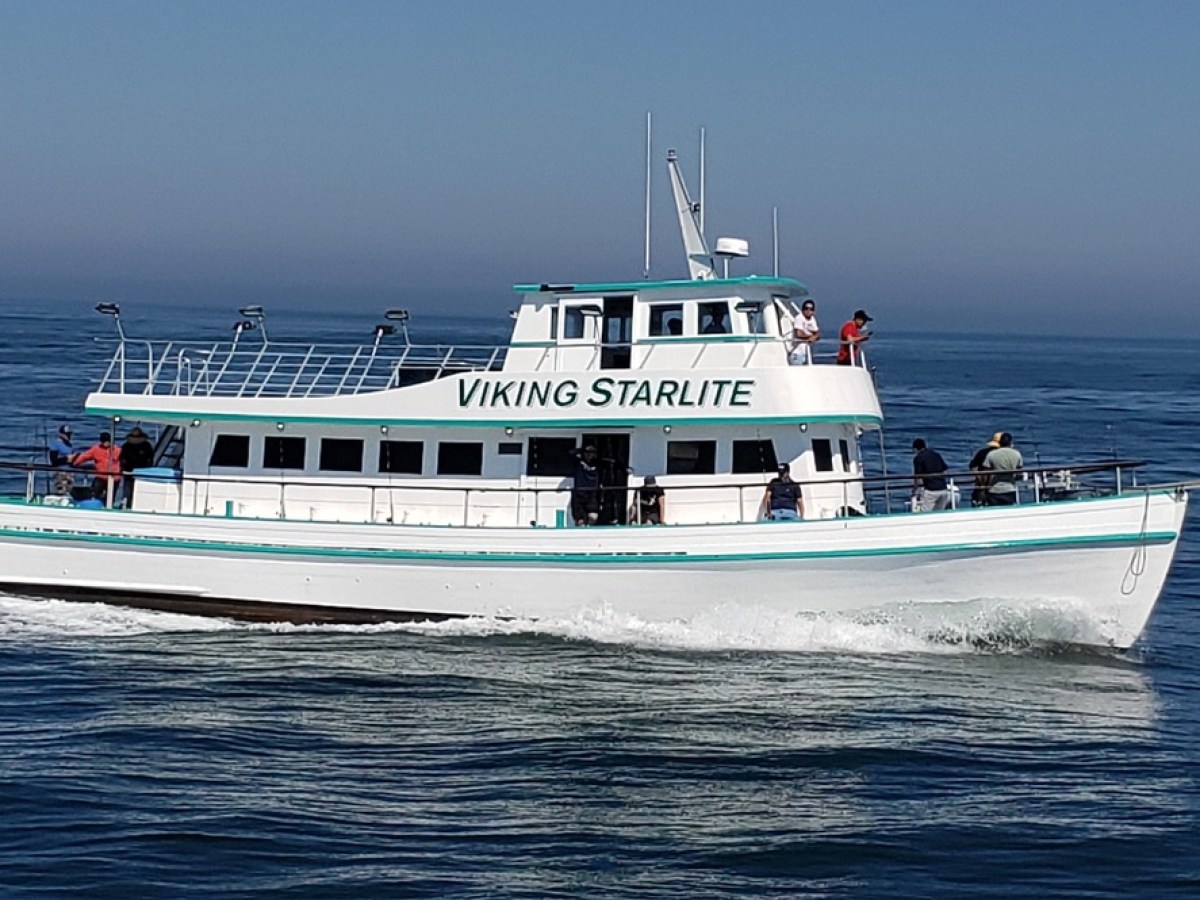 a small boat in a large body of water