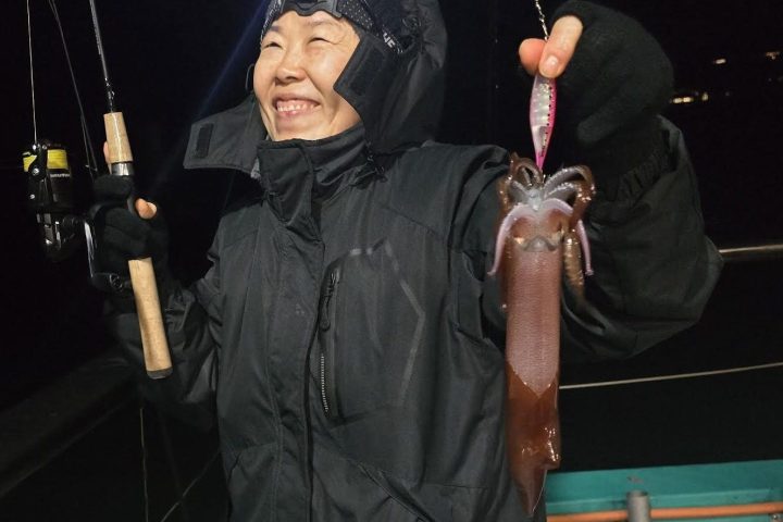 a person standing posing for the camera