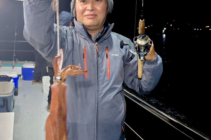 a person standing posing for the camera