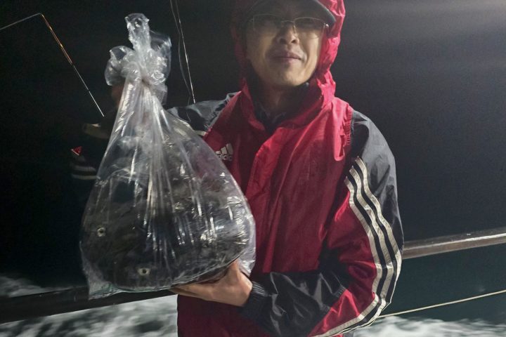 a person that is standing in the rain