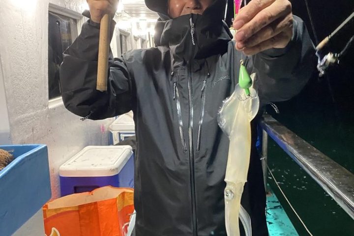 a person standing posing for the camera