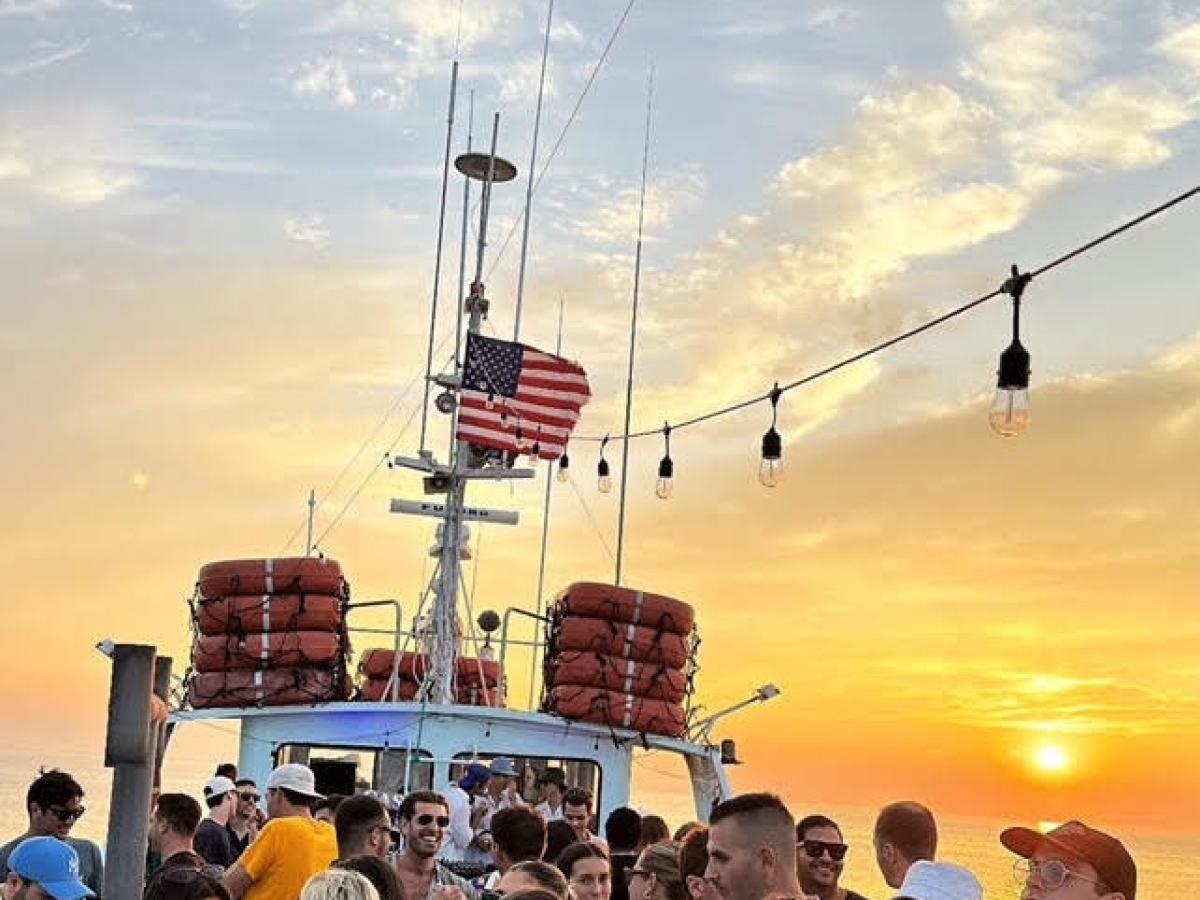 a group of people standing in front of a crowd