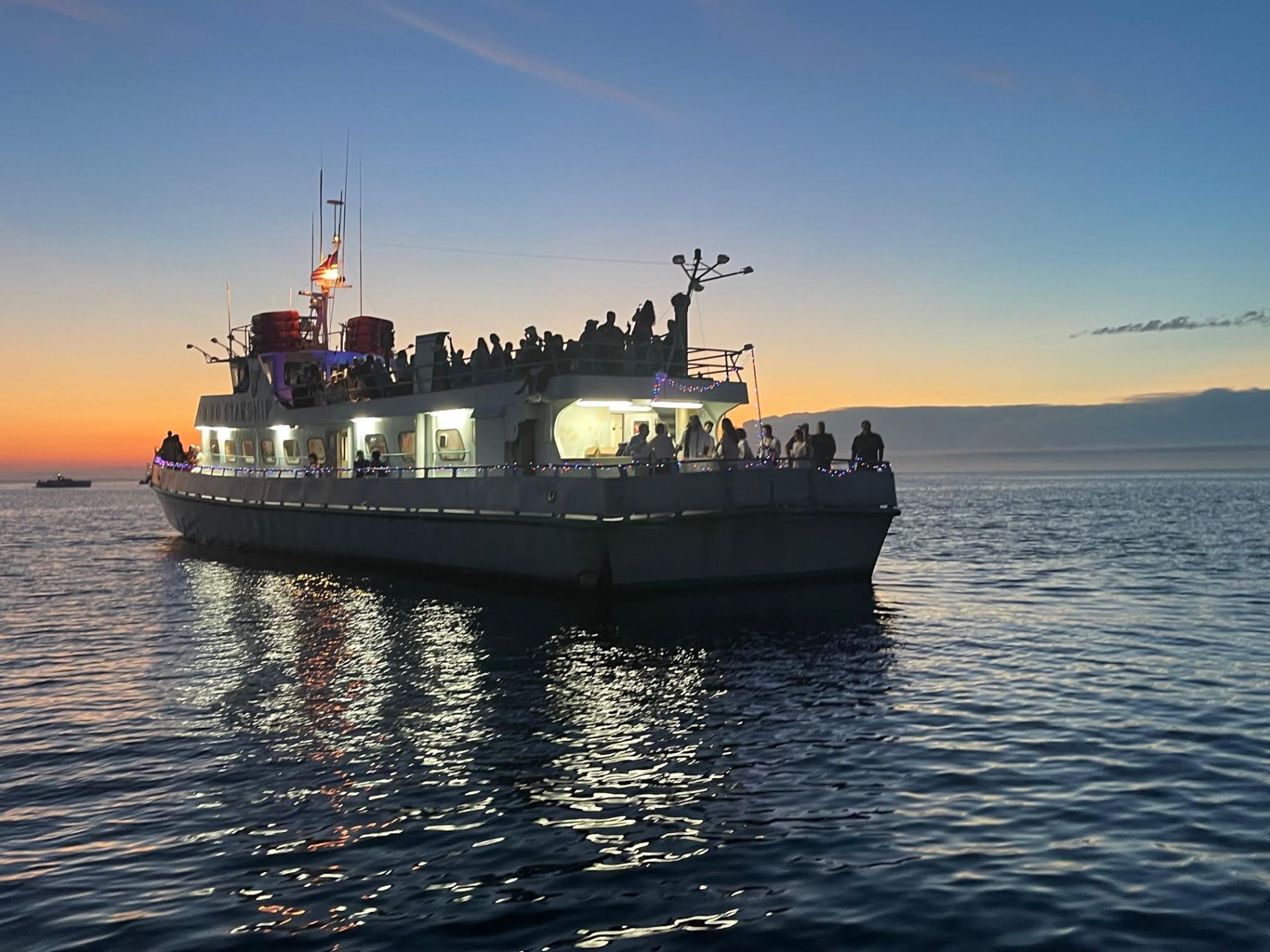 a small boat in a large body of water