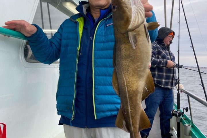 a person standing posing for the camera