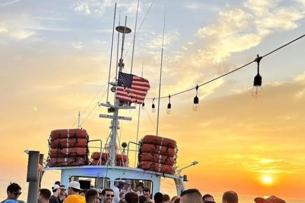 a group of people standing in front of a crowd