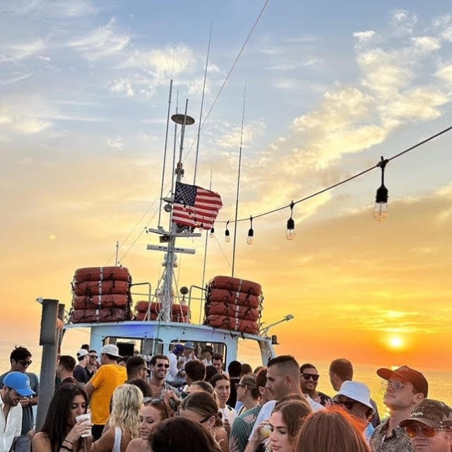 a group of people standing in front of a crowd