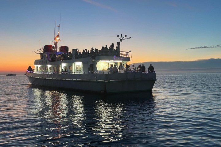 a small boat in a large body of water