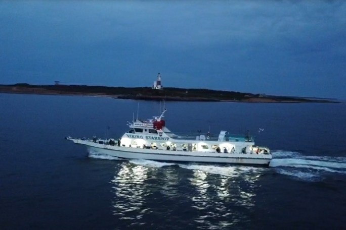 a small boat in a large body of water