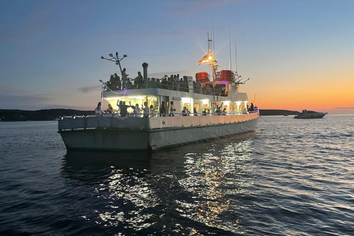a small boat in a large body of water