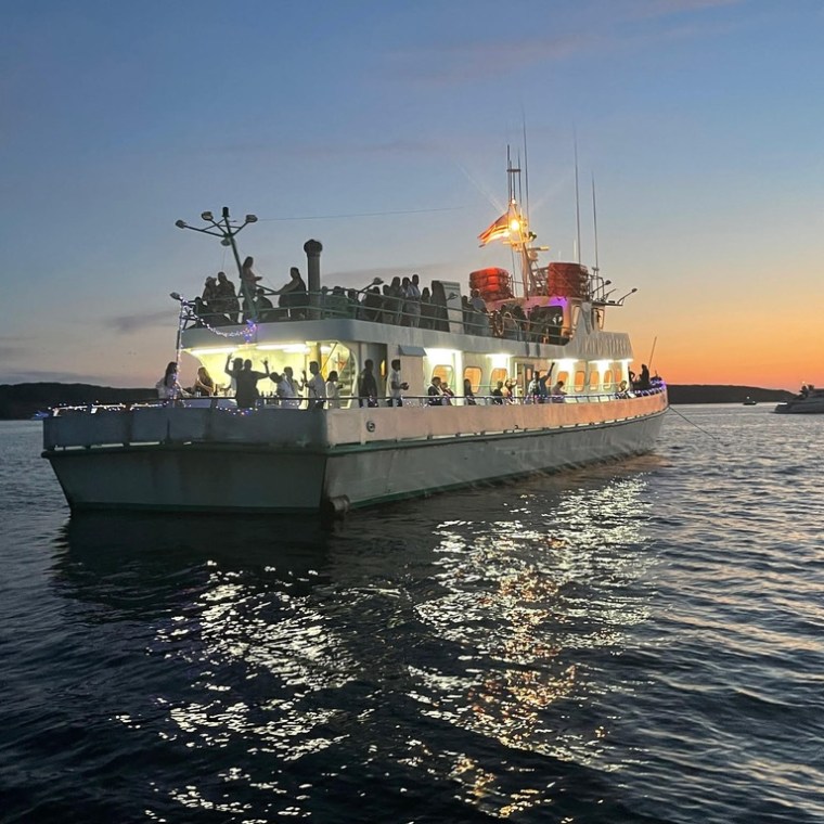 a small boat in a large body of water