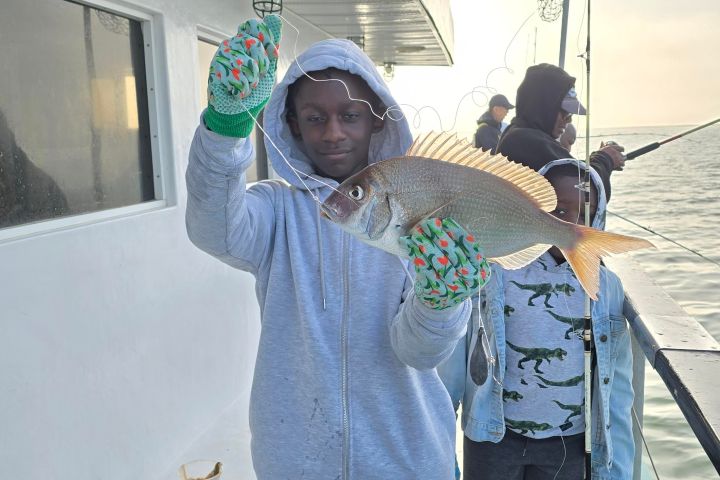 a couple of people that are standing in the snow