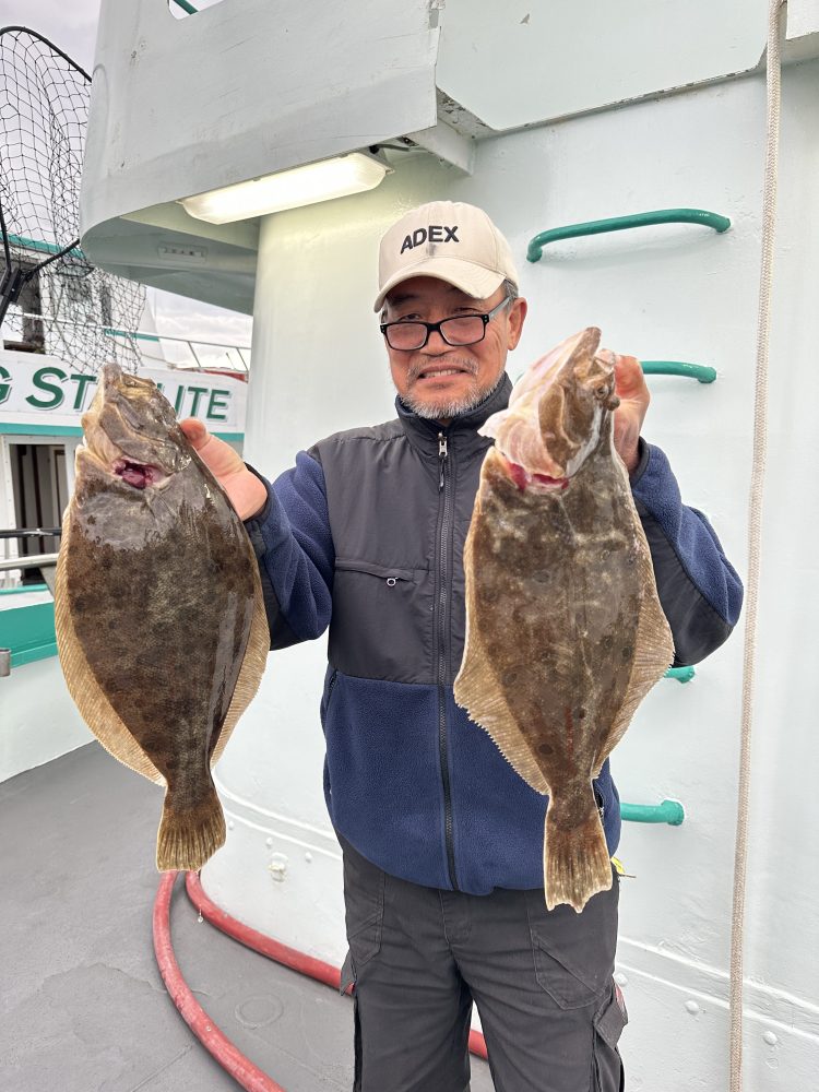 John D. Liu holding a fish